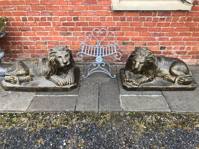 Pair of Large Laying Lions